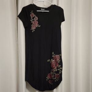 Black dress with red floral accents . Small